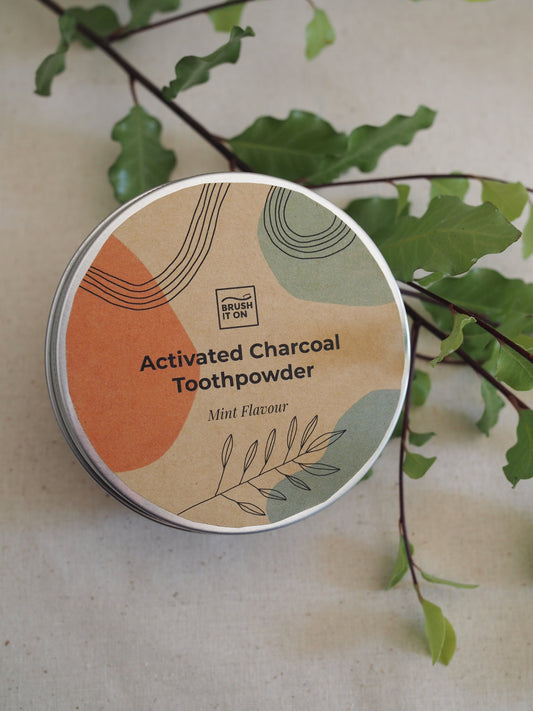Tooth Powder - Aciivated Charcoal - Eco Patch Tin on table
